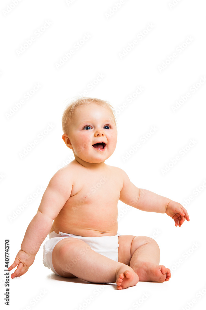 Cute infant girl sitting isolated on white Cute infant girl sitting isolated on white