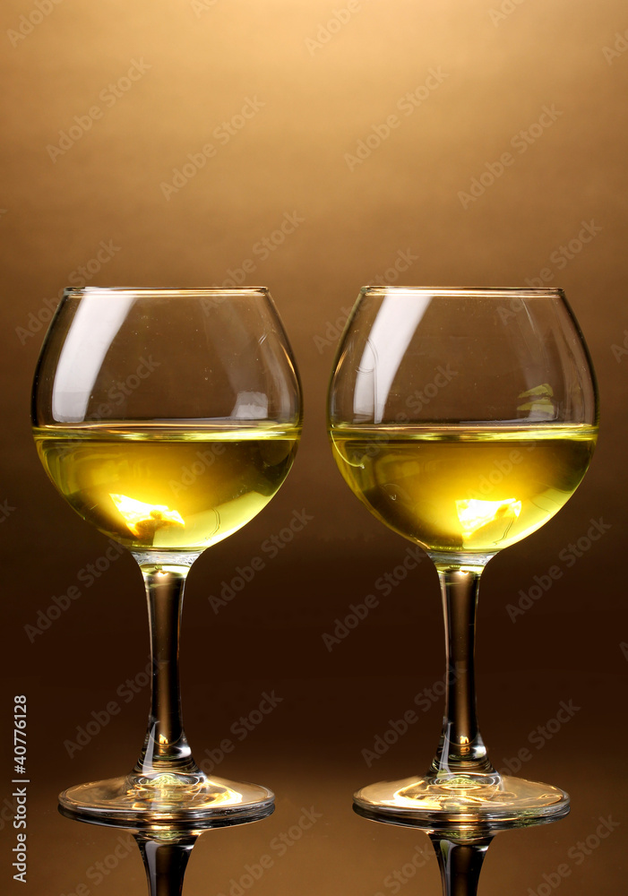 Wineglass on brown background