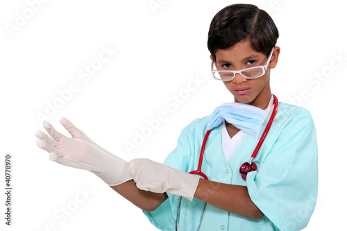Little boy dressed as surgeon photo