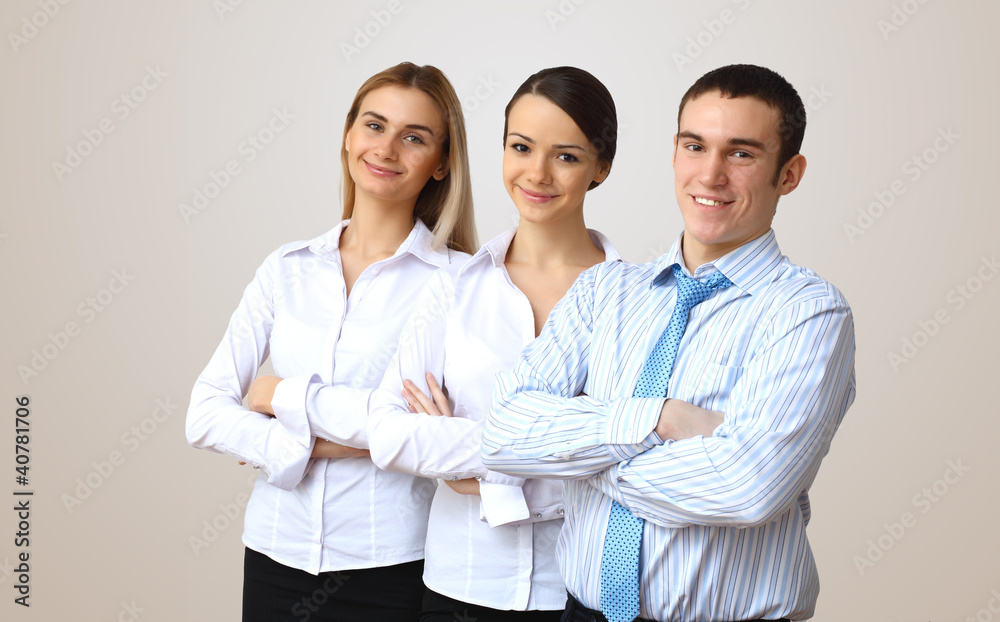 three successful young business persons together three successful young business persons together