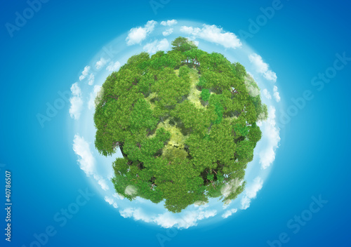 Miniature planet with sparse leafy tree