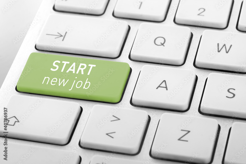Wording Start New Job on computer keyboard Wording Start New Job on computer keyboard