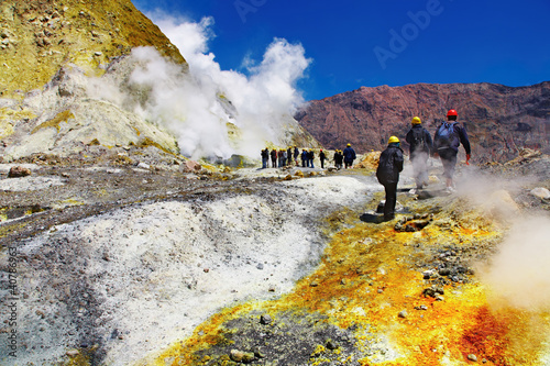 People inside active volcanic crater