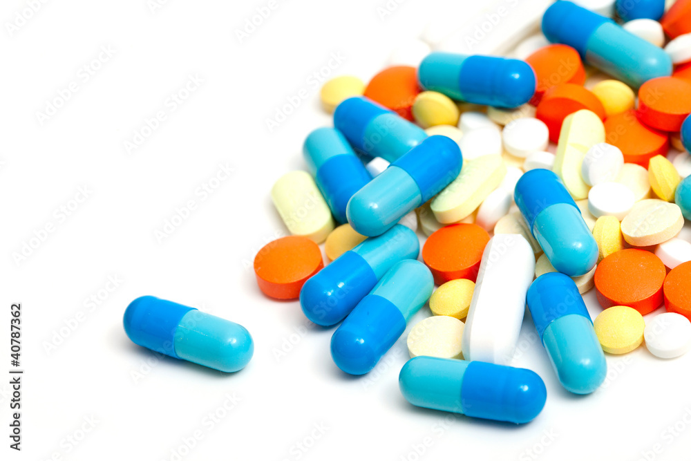 colorful pills on white background colorful pills on white background