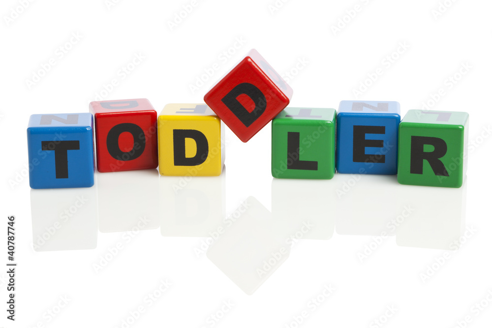 Toddler spelled with alphabet building blocks Toddler spelled with alphabet building blocks