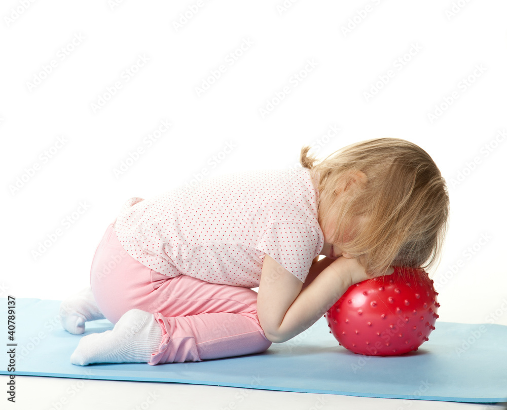 Little child sleeping on a ball Stock Photo Adobe Stock