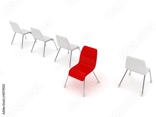 Unique red chair in row of white others