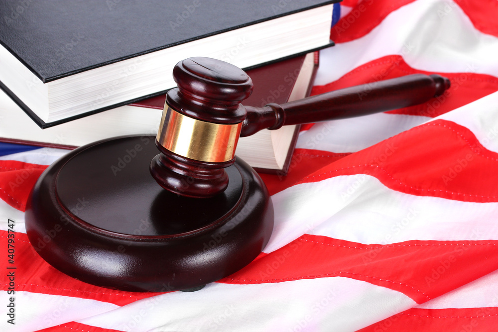 judge gavel and books on american flag background