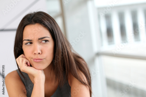 Free Download Portrait of girl with doubtful look on her face - GFXLoad