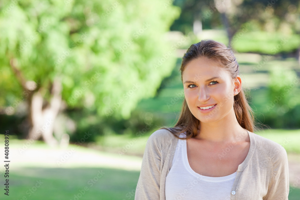 Smiling woman spending her time in the country side Smiling woman spending her time in the country side