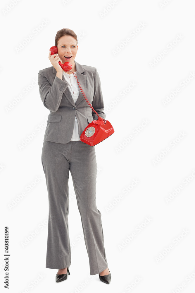 Surprised businesswoman talking on the phone Surprised businesswoman talking on the phone