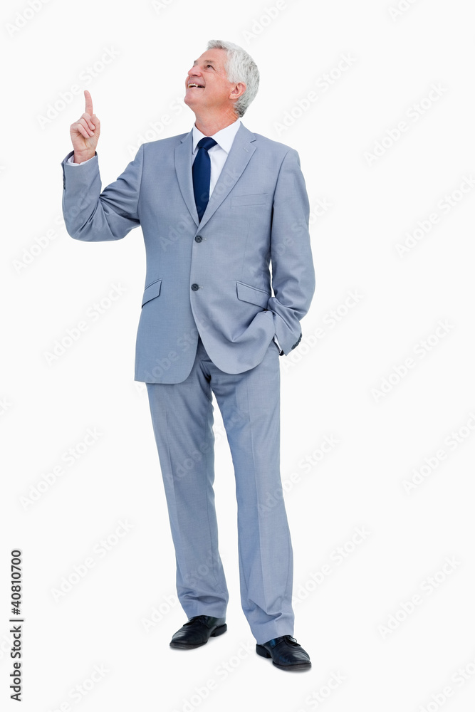 Businessman pointing up