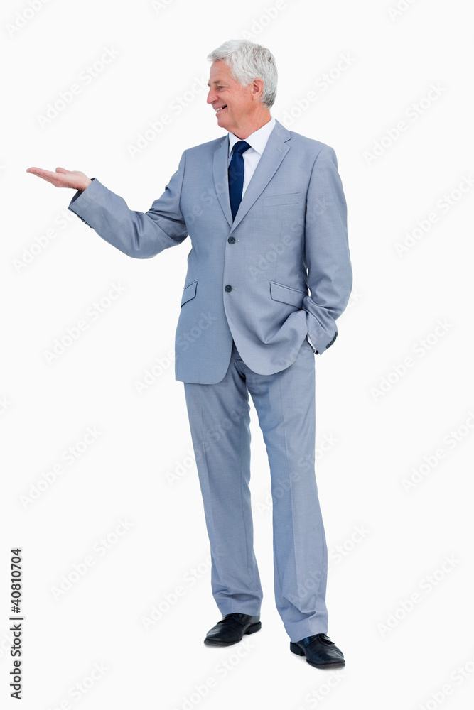 Businessman presenting with hand Businessman presenting with hand