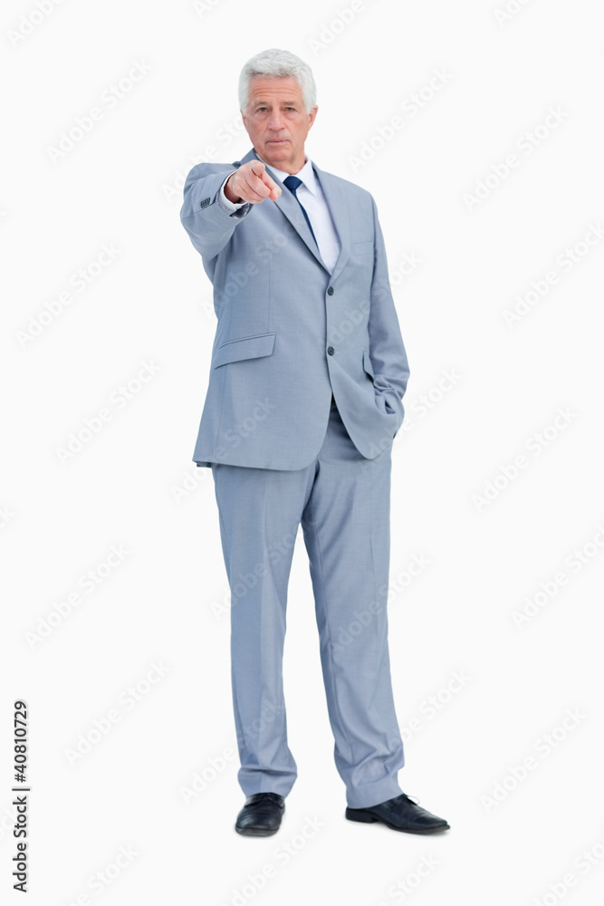 Portrait of a businessman pointing to someone Portrait of a businessman pointing to someone