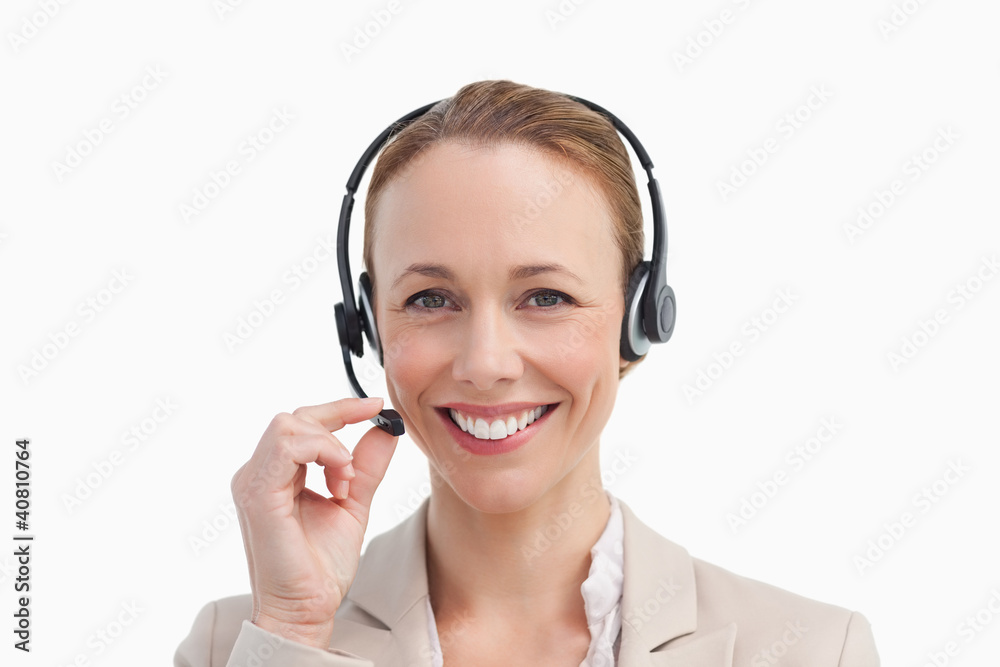 Portrait of a business woman wearing a headset Portrait of a business woman wearing a headset