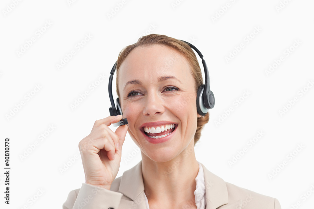 Businesswoman talking with a headset Businesswoman talking with a headset