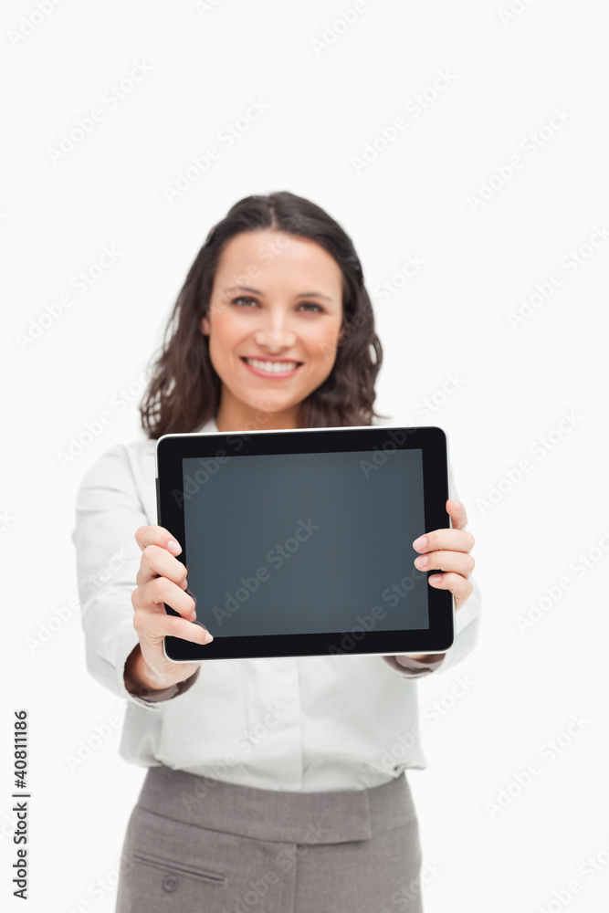 Portrait of a brunette showing a touchpad screen Portrait of a brunette showing a touchpad screen
