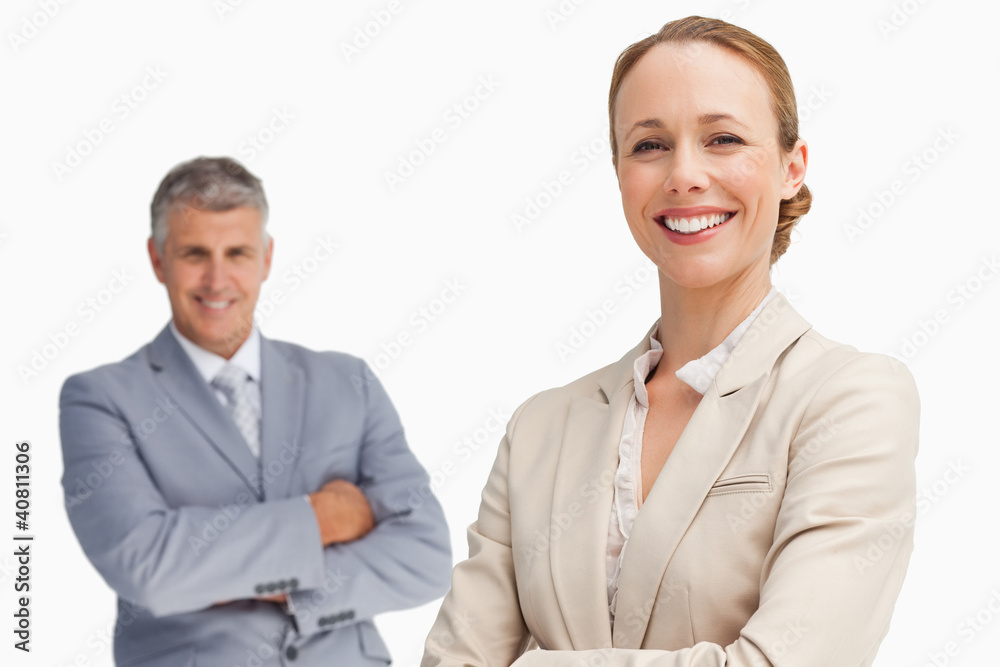 Happy business people with folded arms Happy business people with folded arms