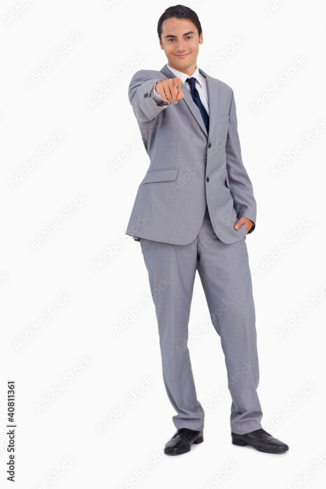 Good-looking man pointing in front of him Good-looking man pointing in front of him