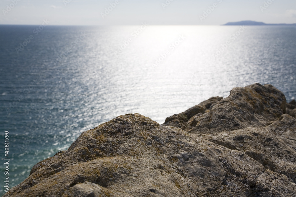View from tip of rock out to sea. Water background View from tip of rock out to sea. Water background