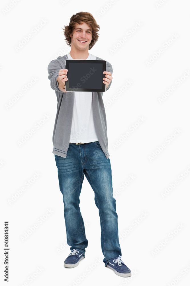 Male student showing a touch pad screen Male student showing a touch pad screen
