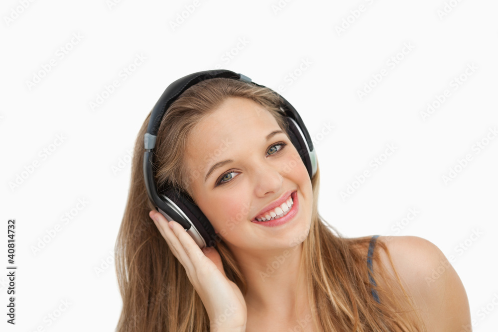 Close-up of a beautiful student wearing headphones Close-up of a beautiful student wearing headphones