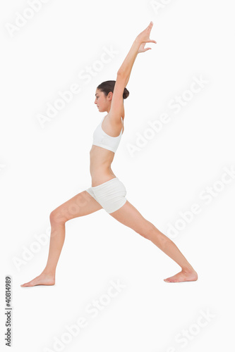 Slim young woman doing yoga