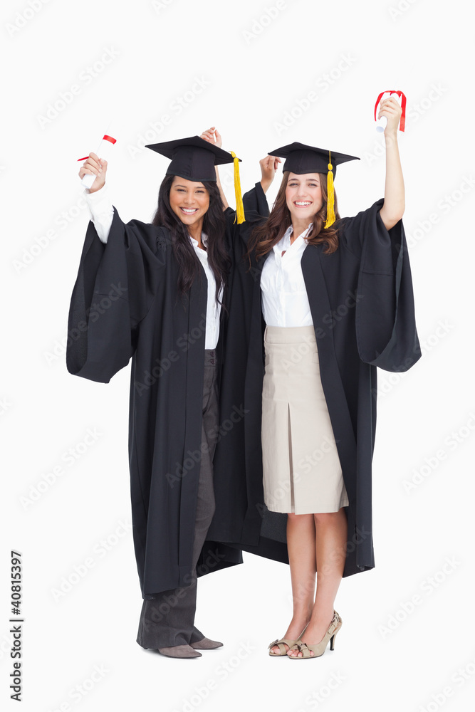 Two women celebrating their graduation Two women celebrating their graduation
