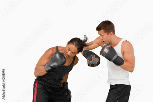 Side view of two fighting boxers