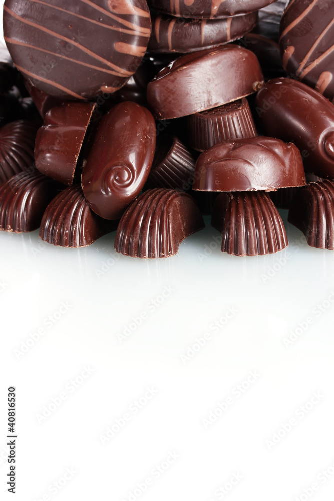 Many different chocolate candy isolated on white Many different chocolate candy isolated on white