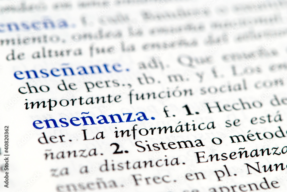 Closeup of Spanish dictionary word for education Closeup of Spanish dictionary word for education