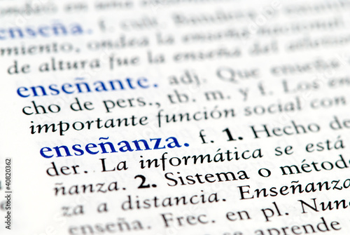 Closeup of Spanish dictionary word for education