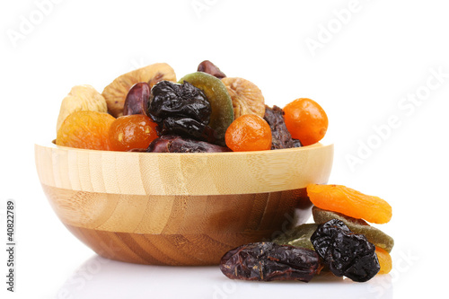 Fototapeta Naklejka Na Ścianę i Meble -  Dried fruits in wooden bowl isolated on white