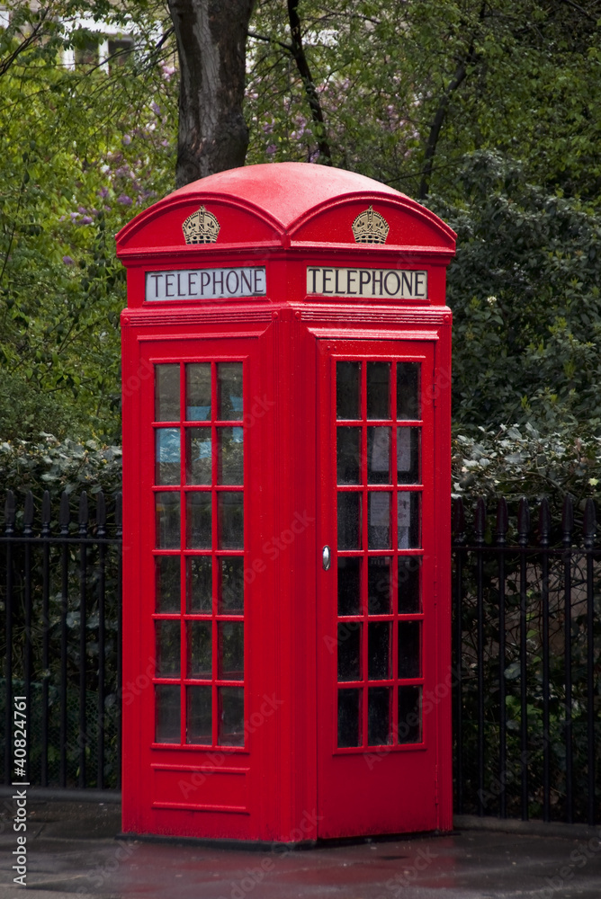 Traditional red telephone box in London Traditional red telephone box in London