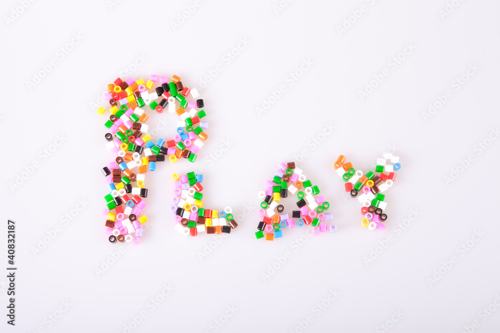 Play beads spelling the word play