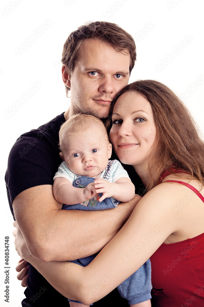 Portrait of a young caucasian couple with baby Portrait of a young caucasian couple with baby