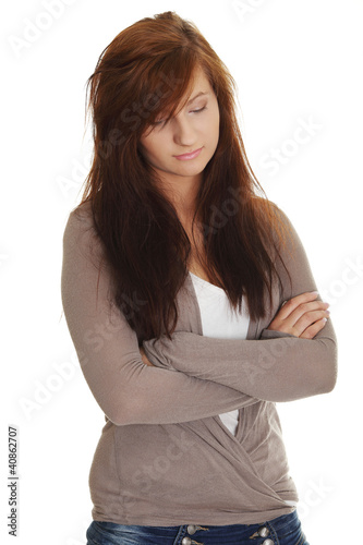 Teen girl in depression, isolated on white 