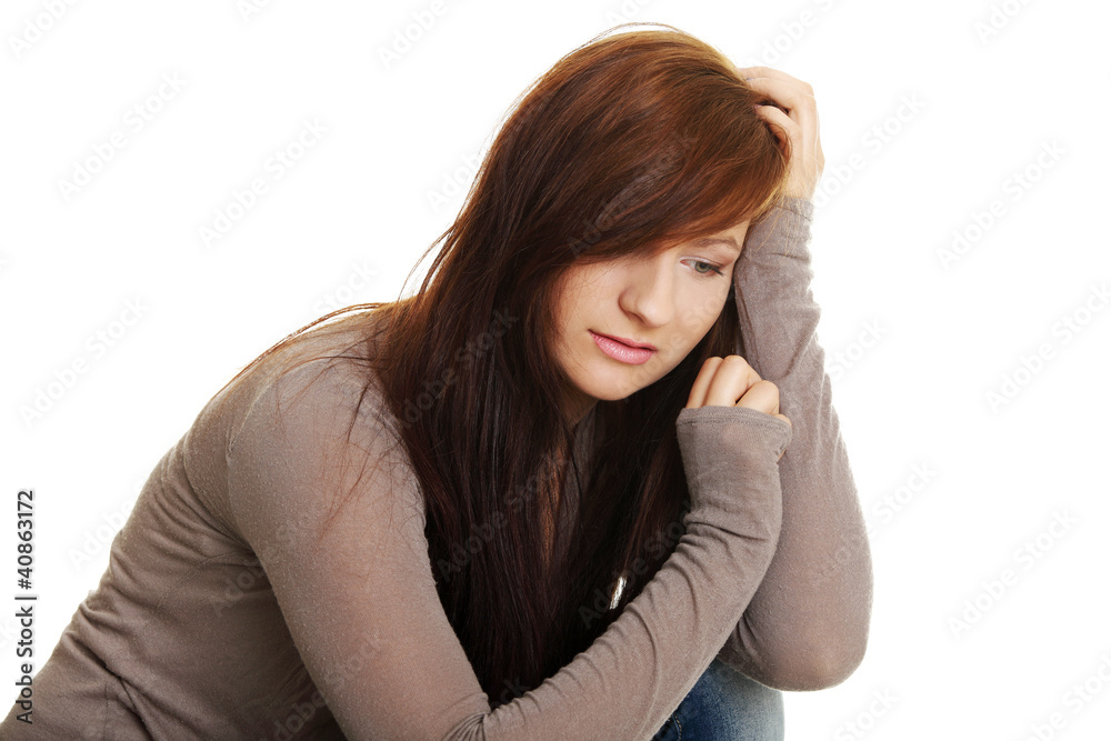 Teen girl in depression, isolated on white Teen girl in depression, isolated on white