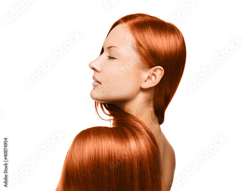 woman with long healthy shiny red hair