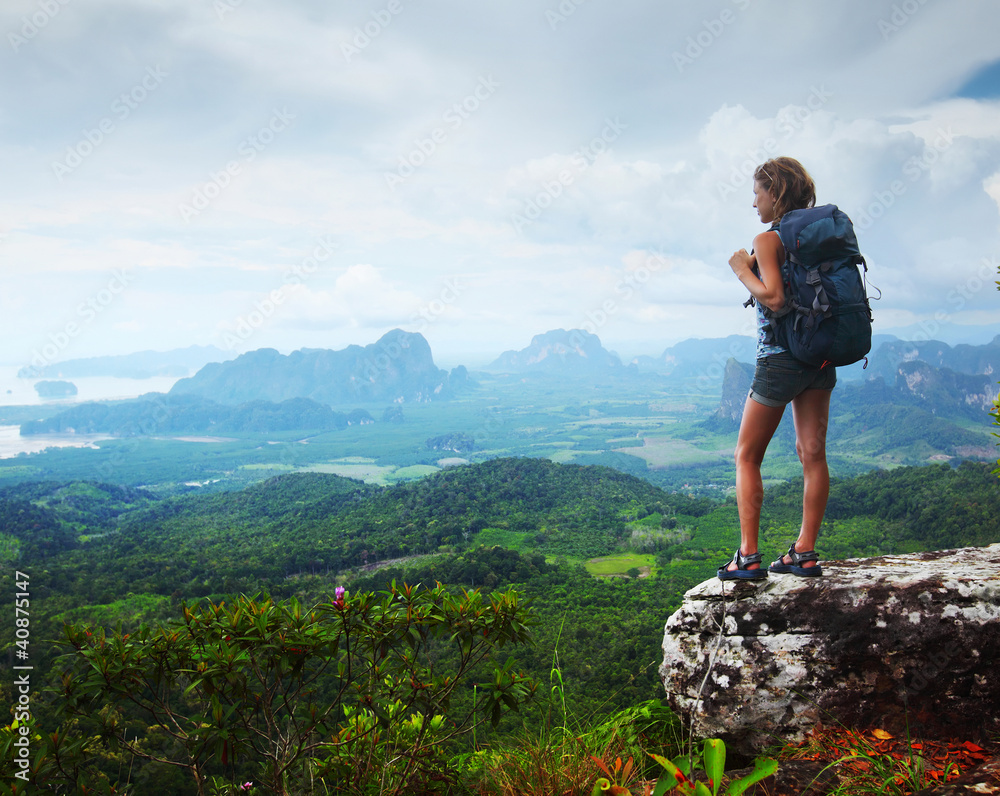 Naklejka premium Tourist with backpack