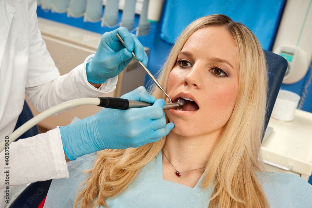 Fototapeta premium woman patient in dentist chair