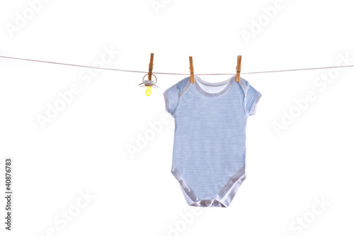 Colorful baby goods hanging on the clothesline