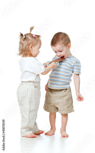 girl entertaining boy by ch...