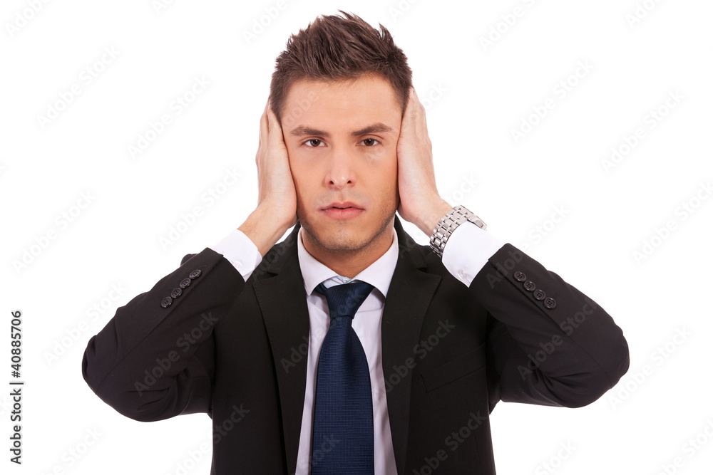 business man in the Hear no evil pose business man in the Hear no evil pose