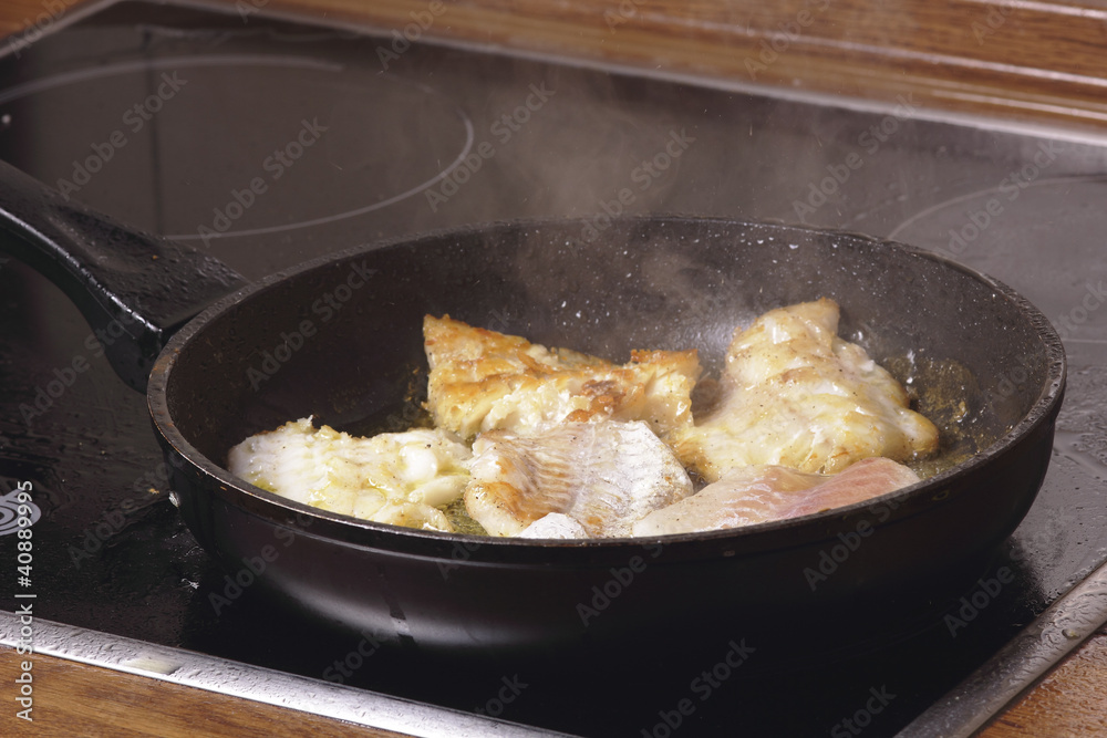 frying fish in the pan frying fish in the pan
