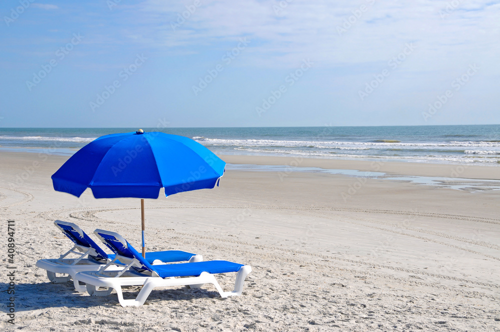 Beach Chairs with Blue Umbrella