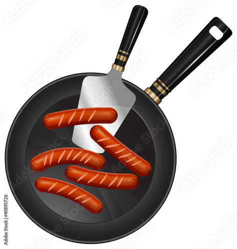 Fried sausages on pan