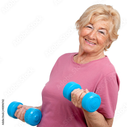 Portrait of senior woman with weights.