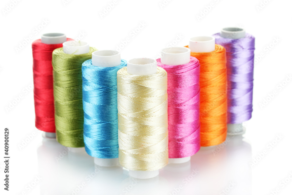 bright bobbin thread isolated on white. bright bobbin thread isolated on white.