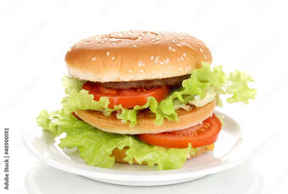Big and tasty hamburger on plate isolated on white Big and tasty hamburger on plate isolated on white